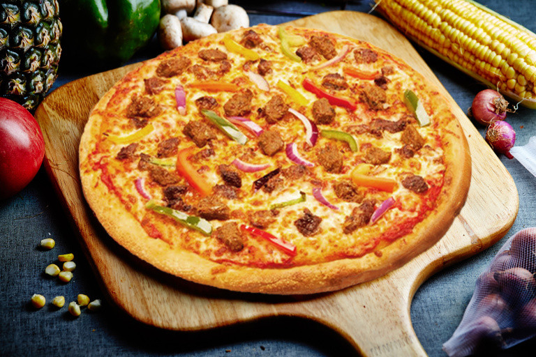 居然在广州餐饮界出现 彭叔做的是英国的手工披萨 食材以进口为主